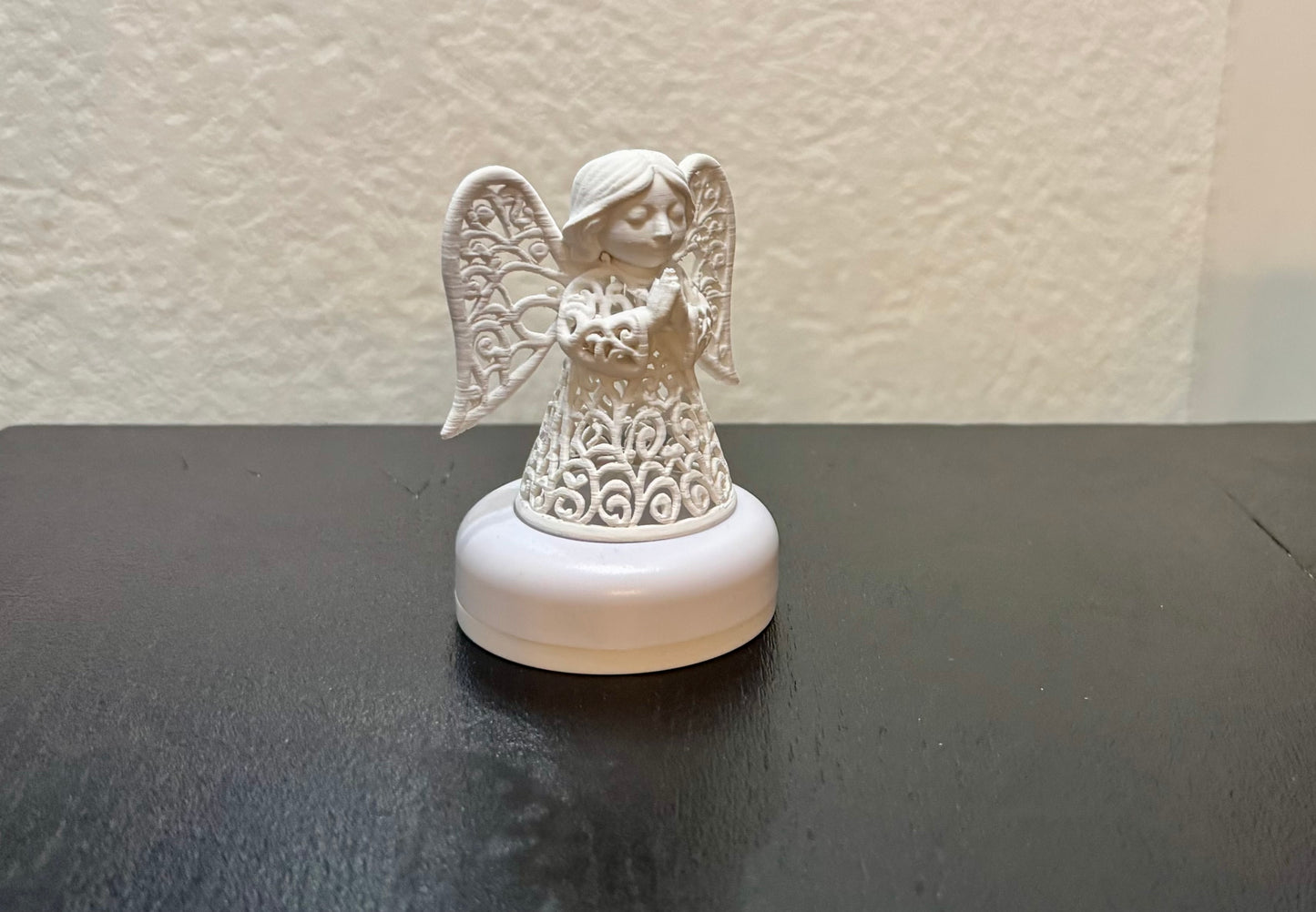 Angel in ornament style for an LED tea light