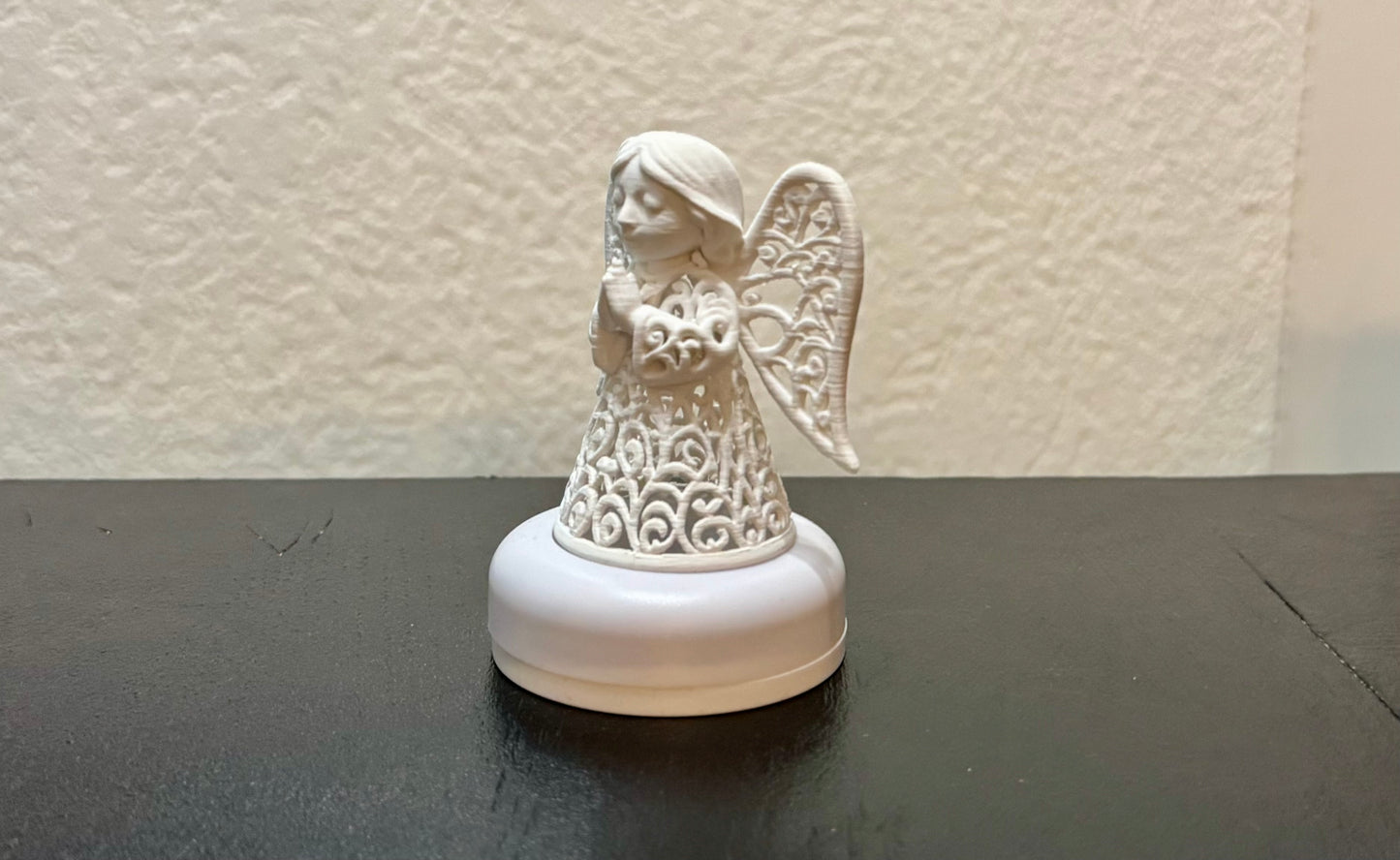 Angel in ornament style for an LED tea light